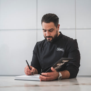 Hey, Chef rolls up his sleeves on his black chef coat and plans out his meals for the day