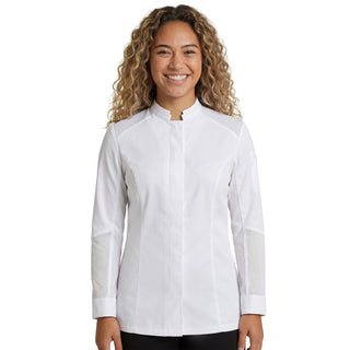 Happy chef, wearing a Marjoram Women's Long Sleeve Chef Coat that is Fitted for Active Kitchen Work 