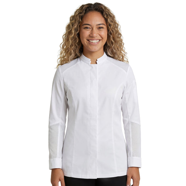 Happy chef, wearing a Marjoram Women's Long Sleeve Chef Coat that is Fitted for Active Kitchen Work 