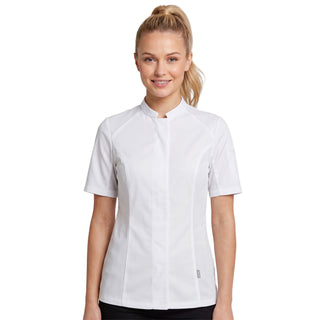 Woman wearing a white short-sleeve shirt with side vents and hidden closure, and pen slot