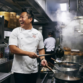 Michelin rated chef in the kitchen wearing a white short sleeve PLATINE Chef jacket by Lafont
